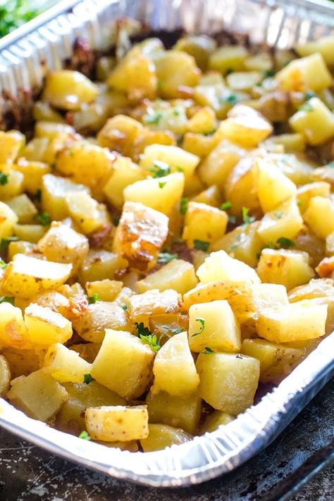 These Cheesy Potatoes on the Grill with Bacon are diced potatoes loaded with butter, onions, bacon and cheese grilled in a foil pan for quick and easy clean up! These grilled potatoes are the perfect side dish that everyone will love! #gimmesomegrilling #potatoes #bacon #onions #cheese #grilledpotatoes #grilling #grilled #recipe #grillingrecipe #sidedish #sidedishrecipe Potatoes On The Grill, Potatoes Loaded, Cheesy Bacon Potatoes, Potatoes With Bacon, Grilled Side Dishes, Barbecue Sides, Bbq Potatoes, Bacon Potato, Grilling Sides