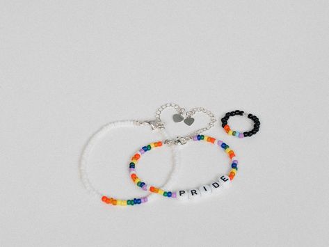 selfmade jewelry with LGBTQIA+ flag, bracelet with rainbow colors, pride accessoires, pride month ring, queer, gay, lesbian community friendly necklace, LGBTQ, DIY Schmuck, Perlenarmbänder Selfmade Jewelry, Flag Bracelet, Pride Month, Diy Schmuck, Rainbow Colors, Diy Jewelry, Flag, Rainbow, Bracelet