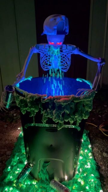 Lifeonwillowcreek | Morgan & Ian on Instagram: "We decided to put our own twist on the viral puking skeleton. These 5' skeletons sell out fast so it's never too early to get going on this project!☠️ 🎃 👻 

Supplies:
• a sense of humor 
•garbage can
•wooden base & bucket (optional)
•2-3 cans of spray foam
•neon green spray paint
• skeleton (5' one from Home Depot)
• holiday lights 
• water pump (Amazon)
• water proof black light (Amazon)
• 3/4 " clear tubing
• zip ties
• case of @michelobultra (optional) 😅

P.s, Our skeleton is 21 years of age 😂 

#halloweendecor #halloweendiy #pukingskeleton #skeletondecor #halloweendecorations #halloweentutorial #easydiy #spookyseason #homediy #trickortreat🎃" Paint Skeleton, Green Spray Paint, Halloween Tutorial, Skeleton Decorations, Fall Craft, Up Costumes, Spray Foam, Halloween Make Up, Zip Ties