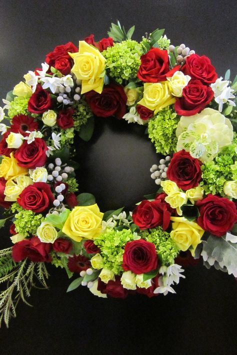 Standing wreath of red and yellow roses with green hydrangea. Standing Wreath, Red And Yellow Roses, Floral Boutique, Green Hydrangea, Red And Yellow, Flowers Diy, Yellow Roses, Celebration Of Life, Door Hangers