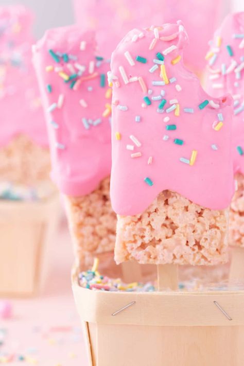 You'll love the Barbie Movie Inspired Pink Popsicle Rice Krispie Treats! These Pink Popsicle Rice Krispie Treats are crunchy and sweet with pink melted candy and colored sprinkles. They’re fun treats that are perfect for summer parties, Barbie-themed birthdays, and other social gatherings - guaranteed to make your friends and family smile! Popsicle Rice Krispie Treats, Rice Krispie Popsicle, Rice Crispies Treats, Dipped Rice Krispie Treats, Sweet Party Ideas, Two Sweet Party, Bday Treats, Caroline Birthday, Melted Candy