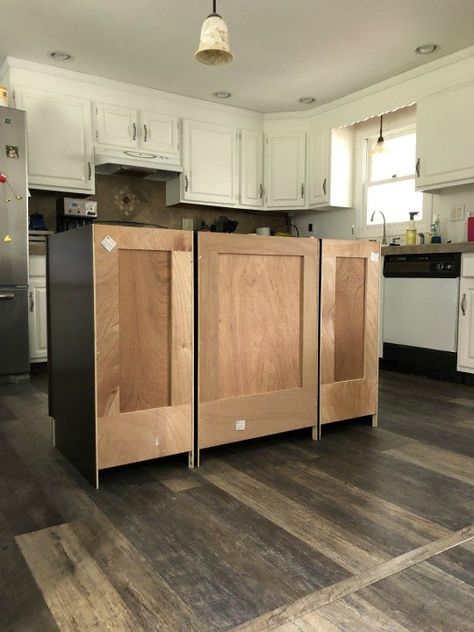 When we moved into our home the kitchen didn’t have a proper island. It was a “bar” that looked like it belonged on a patio. I always wanted an actual island with storage that fit the rest of the kitchen but didn’t want to spend the money on something already built. Then I found these 3 base cabinets on FB Marketplace with a granite top, for $200!Bonus I sold the other one for $150! These were 3 base cabinets and one had all drawers which is exactly what I have been looking for. Th… Build Kitchen Island, Best Cabinet Paint, Cabinet Island, Cabinet Trim, Kitchen Base Cabinets, Rustic Kitchen Island, Stock Cabinets, New Countertops, Diy Kitchen Island