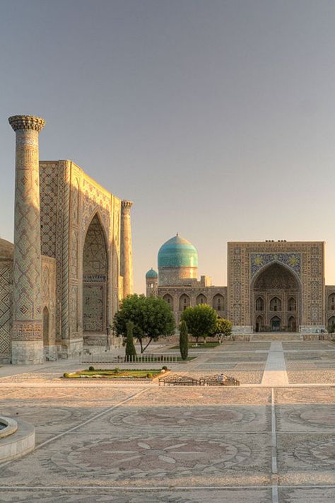 Samarkand’s Registan Square was once called one of the most beautiful squares in the world, and it’s easy to see why. This public square was the heart of the ancient city of Samarkand during the Timurid dynasty. It is known for its beautiful Islamic architecture and three imposing madrassas. In Tajik, Registan translates to “sandy place”. With such a rich cultural heritage and so many amazing places to visit in Uzbekistan, it should definitely be on your list of potential holiday destinations. Registan Square, Uzbekistan Samarkand, Travelling Asia, Uzbekistan Travel, Sheesh Mahal, Islamic City, Islam Art, Samarkand Uzbekistan, Culture Aesthetic