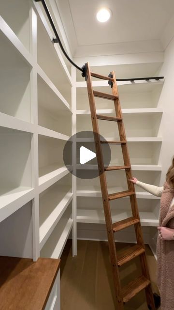 This is a custom pantry design for a recent Gallup Design Build project. Large open shelves for storage space for pantry staples and a rolling ladder. Follow us on Instagram for more custom home inspiration! Ladder In Pantry, Pantry Ladder Ideas, Pantry Creation, Pantry With Ladder, L Shape Pantry, Large Pantry Organization, Pantry Ladder, L Shaped Pantry, Peter Bjorn And John