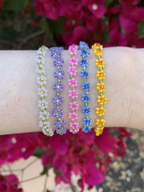 handmade jewlery, daisy bracelets, seed bead jewelry, pastel rainbow, stacking bracelets, daisy chain, y2k jewelry, vsco jewlery, summer accessories Collar Aesthetic, Daisy Bracelets, Pastel Bracelet, Necklace Aesthetic, Bracelet Stacks, Handmade Jewlery, Y2k Jewelry, Stacking Bracelets, Seed Bead Bracelet