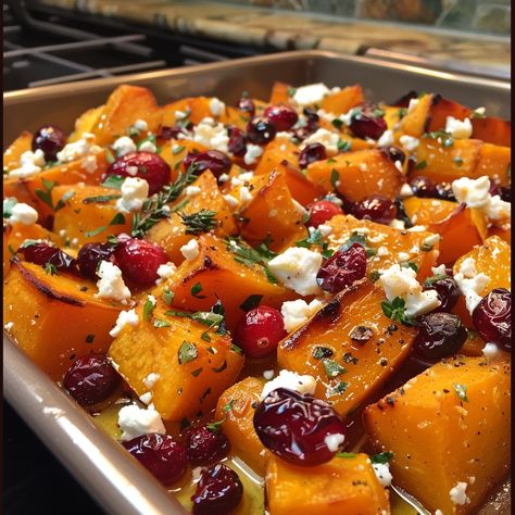 🍯🍂 Sweeten your autumn with Honey Roasted Butternut Squash with Cranberries and Feta! 🍁 Honey Roasted Butternut Squash with Cranberries and Feta Ingredients: Butternut squash: 1, cubed Dried cranberries: 1/2 cup Feta cheese: 1/2 cup, crumbled Honey: 3 tbsp Olive oil: 2 tbsp Salt and pepper: To taste Instructions: Preheat oven to 400°F. Toss squash with honey, oil, salt, and pepper. Roast for 25 minutes. Add cranberries, roast 10 more minutes. Top with feta before serving. 🍴 Indulge in the... Honey Roasted Butternut Squash, Butternut Squash With Cranberries, Feta Honey, Thanksgiving Appetizer, Thanksgiving Appetizer Recipes, Instagram Recipes, Twisted Recipes, Vegetable Side Dishes Recipes, Honey Oil