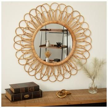 Full Dimensions: 31" H x 31" W x 1.25" D Mirror Dimensions: 15" H x 15" W Material: MDF, Plywood & Glass Shape: Sunburst Color: Brown & Light Brown Orientation: Vertical Includes: 1 Sawtooth Hanger Care & Safety: Do Not Hang With Wire Quantity: 1 Make your townhouse feel a little more like a beach bungalow with this fun, textured mirror! Boho Rattan Flower Round Wall Mirror features a MDF and plywood base and has rattan petals that come out in two layered rows. Hang this fun accent mirror up in your living room or bedroom to increase your home's boho charm! Boho Theme Bedroom Decor, Cool Mirror Decor, Boho House Bathroom, Rattan Flower Mirror, Fun Wall Mirror, Pink Boho Room Decor, Boho Music Bedroom, Boho Sun Decor, Boho Wooden Wall Decor