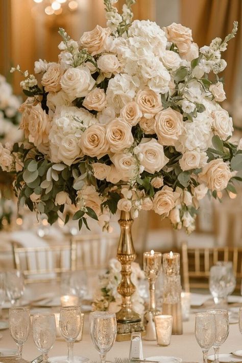 Timeless Elegance: Ivory and Blush Perfection White And Tan Floral Arrangements, Ivory Flower Centerpieces, White And Cream Flower Arrangements, Large White Floral Arrangements Wedding, Wedding Centerpieces Romantic Elegant, Pink White Green Wedding Centerpieces, Champagne Wedding Theme Flowers, Elegant And Romantic Wedding Decor, Raised Centerpieces Wedding