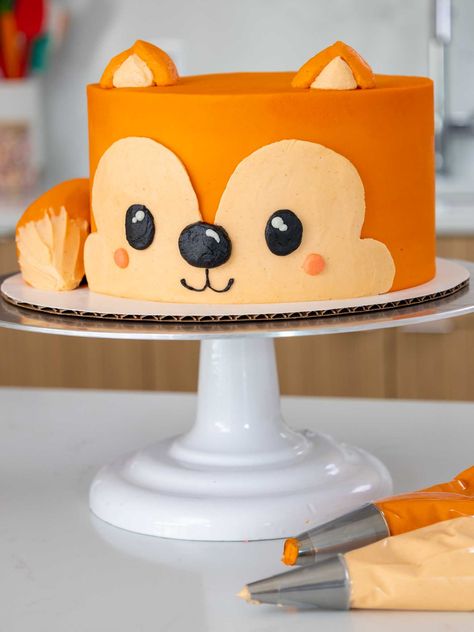 Learn how to make this adorable fox cake! It's made with tender orange velvet cake layers and decorated with buttercream frosting. Orange Cake Ideas, Vanilla Cream Cake Recipe, Orange Birthday Cake, Orange Chiffon Cake, Fox Cake, Cake Land, Homemade Buttercream Frosting, Orange Buttercream, Moist Vanilla Cake