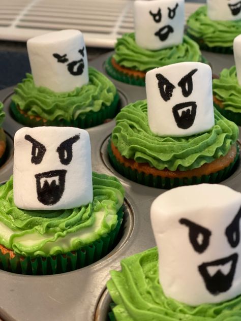 Luigis Mansion Cupcakes with green Jello pokes Luigi Mansion Party Decorations, Luigis Mansion 3 Party, Luigi Mansion Cake, Luigi’s Mansion Birthday Party, Luigi Mansion Party Ideas, Luigis Mansion Birthday Party, Luigi's Haunted Mansion, Luigi Board, Luigis Mansion