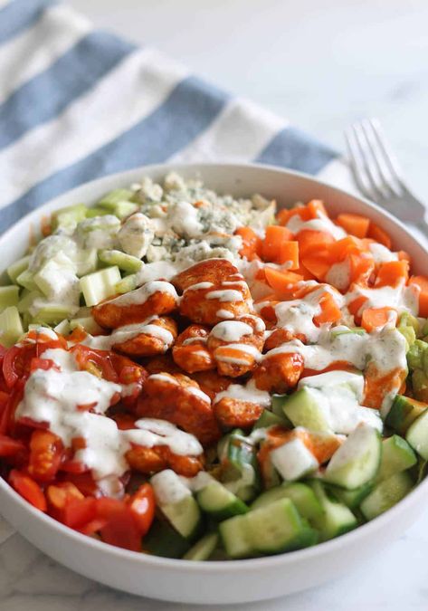 This homemade chopped buffalo chicken salad recipe is made with crisp, fresh vegetables, bite-size pieces of buffalo chicken, creamy avocado, tangy blue cheese, and a homemade ranch dressing.  You can get all the flavors of this favorite restaurant salad right at home! Chopped Buffalo Chicken Salad, Buffalo Chicken Chopped Salad, Buffalo Chicken Salad Recipe Healthy, Crispy Buffalo Chicken Salad, Healthy Buffalo Chicken Salad, Buffalo Chicken Salad Meal Prep, Sweet Green Buffalo Chicken Salad, High Protein Buffalo Chicken Salad, Chicken Chopped Salad Recipes