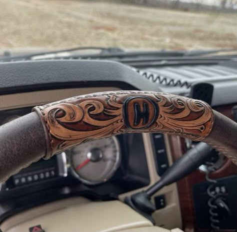 Punchy Truck Accessories, Tooled Leather Steering Wheel Cover, Leather Tooling Ideas, Western Truck Accessories, Tooled Leather Projects, Western Car Accessories, Truck Interior Ideas, Truck Interior Accessories, Interior Purple