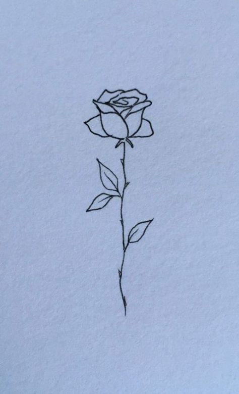 Simple rose stencil tattoo design Rose On A Stem Tattoo, Cute Simple Rose Tattoos, Small Rose Tattoo On Chest, Rose No Stem Tattoo, Fine Like Rose Tattoo, Rose With Long Stem Tattoo, Rose Tattoo Small Wrist, Tiny Rose Drawing, Small Simple Hip Tattoos