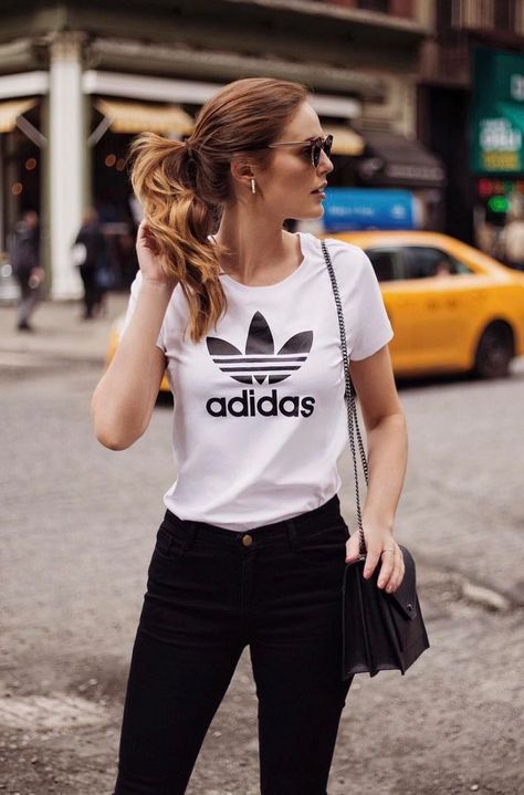 Cute Adidas Outfits For Women |  White Adidas T-shirt With Black Skinny Jeans - This casual outfit with the black Adidas Trefoil top is the perfect aesthetic! One of the cutest summer outfits for women. Image  LikeToKnowIt. This is an affiliate link. If Adidas Outfits For Women, Adidas Leggings Outfit, Adidas Outfits, Adidas Outfit Women, Summer Outfits For Women, Perfect Aesthetic, Look Adidas, Adidas T Shirt, Adidas Originals Women