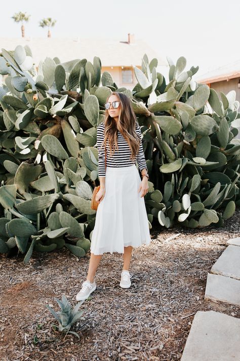 how to wear sneakers with a midi skirt | merricksart.com Midi Skirt With Sneakers, Midi Skirt And Sneakers, White Midi Skirt Outfit, Fashion Scarf Tying, Skirt With Sneakers, Leather Leggings Look, Basic Sneakers, Skirts With Sneakers, Corporate Casual