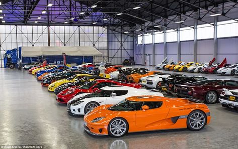 Out of the rain: One supercar fan dressed as Top Gear's The Stig stands in the middle of the fleet as they are lined up inside a hanger Luxury Car Garage, Luxury Cars Rolls Royce, Dream Car Garage, Luxury Garage, Car Museum, Ferrari F40, Car Showroom, Super Luxury Cars, Best Luxury Cars