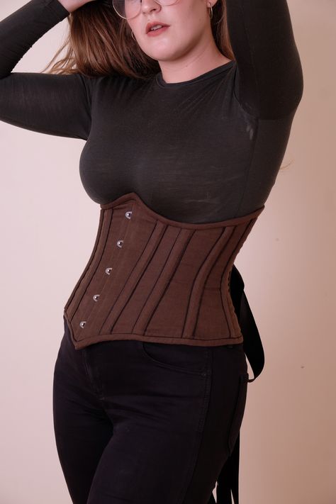 Under-Bust Corset. Outer is 100% Linen, inner is 100% polyester satin. I wanted to test my skills by adding a piping look to each external boning channel. This corset features laceup eyelets at the back, busk, and steel boning. Under Bust Corset, Polyester Satin, Piping, The Back, Turtle Neck, Lace Up, Satin