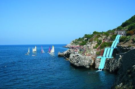 This waterslide lets you slide right out into the Mediterranean Sea // 18 Of The Coolest Water Slides From Around The World Cool Water Slides, Sicily Hotels, Water Slide, Water Slides, Pretty Places, Oh The Places Youll Go, Dream Destinations, Water Park, Palermo