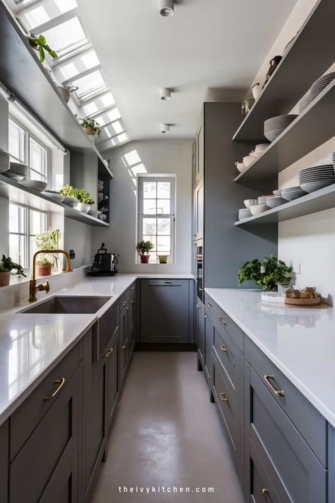 Modern narrow kitchen with gray cabinets, white countertops, open shelves, and abundant natural light. Double Gallery Kitchen Layout, Narrow Kitchen Ideas Layout, Long Narrow Kitchen Ideas, Kitchen Ideas Small Spaces, Cozy Apartment Kitchen, Narrow Galley Kitchen, Gallery Kitchen Layout, Farmhouse Galley Kitchen, Small Galley Kitchen Ideas