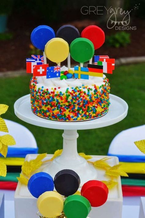 Colorful cake at an Olympics summer party! See more party planning ideas at CatchMyParty.com! Olympic Birthday Cake, Olympic Cake, Pool Birthday Cakes, Summer Olympics Party, Olympic Food, Soldier Party, Olympic Theme Party, Olympics Party, Summer Party Ideas