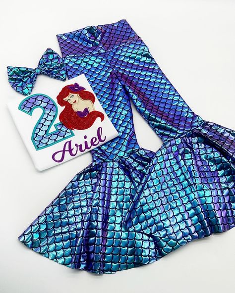 This adorable Mermaid Bellbottom Outfit themed is perfect for your little one's Bday Party Welcome to BdayFashionBoutique This Beautiful Purple/Green Chromatic Mermaid Bell Bottom Outfit Set is made with knit stretchy fabric that reflect purple and green with the movement.  The Shirt is a Boutique quality shirt with cute puff sleeves that will make your little one look amazing. All of our outfits are made with the best and most high-quality materials possible, as well with all the love and dedic Ariel Birthday Outfit, Mermaid Birthday Shirts For Family, Mermaid Birthday Outfit For Girl, Mermaid Birthday Party Outfit, Bellbottom Outfit, Bell Bottom Outfit, Bottoms Outfit, Mermaid Pants, Bell Bottoms Pants