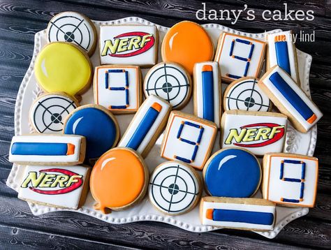 A simple Nerf set from last month, for a little guy who came home from school with a sticker from one of my cookie bags back in December.… Nerf Cookies, Nerf Cake, Nerf Birthday Party, Nerf Party, 9th Birthday Parties, Cookie Bags, 10th Birthday Parties, 6th Birthday Parties, Boy Birthday Party