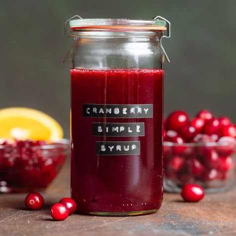 This Cranberry Simple Syrup is delicious, easy, and perfect for the holidays! Ready in 30 mins and amazing in cocktails, mocktails, and more! Cranberry Simple Syrup Recipe, Juniper Syrup, Roasted Frozen Green Beans, Cranberry Syrup, Cranberry Simple Syrup, Cajun Salmon, Simple Syrup Recipes, Breakfast Appetizers, Pickled Eggs