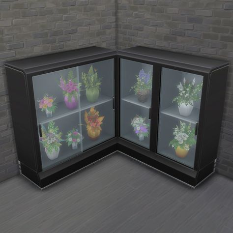 These fridges work as retail displays with shelves that you can put flower arrangements on. Setting arrangements on the shelf will keep them fresh for longer. You can also choose to set any arrangements sitting on them for sale in a retail shop. Customers will browse the retail fridges and eventually purchase them. Sims 4 Retail, Flower Fridge, Witchy House, Retail Displays, Party Table Settings, Behind The Glass, Retail Shelving, Flower Display, Sims 4 Cc Finds