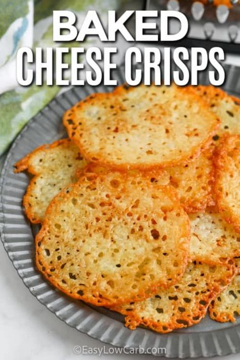 This low carb and keto Mozzarella Cheese Crisps Recipe is super easy to make. With just 5 minutes to prep and only 5 minutes to bake, this recipe is the answer to a snack attack or last minute guests! Use parmesan and cheddar cheese to create a new signature combination. Or add seasonings to flavor them in a Mexican, southwestern or Italian style. Delicious and crispy, these baked cheese crisps are perfect served with dip, too! #easylowcarb #cheesecrispsrecipe #bakedcheesecrisps #lowcarbsnacks Baked Cheese Crisps, Homemade Mozzarella Cheese, Recipes With Mozzarella Cheese, Crisps Recipe, Mozzarella Recipes, Parmesan Crisps, Cheese Chips, Cheese Crisps, Cheese Snacks