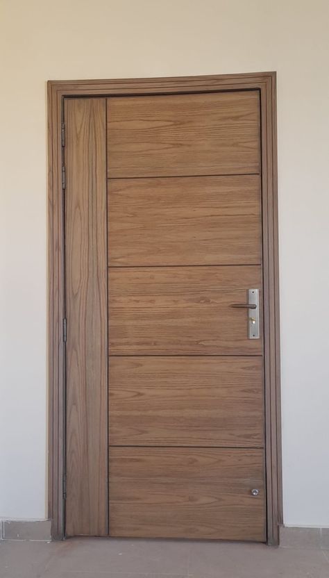 Elegant, sturdy door that adds charm and withstands daily use Flush Door Design, House Window Design, Modern Tv Wall Units, House Main Gates Design, Pivot Door, Wooden Front Door Design, Wooden Main Door, Modern Tv Wall, Wooden Main Door Design