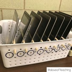 Use containers and rods to create technology storage. Makerspace Organization, Chromebook Storage, Ipad Storage, Teaching Organization, Classroom Hacks, Classroom Organisation, Classroom Storage, Flexible Seating, New Classroom