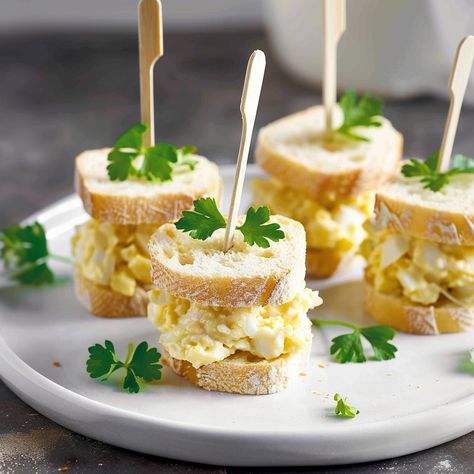 In the realm of light and elegant snacks that grace afternoon tea tables or dainty party spreads, egg salad tea sandwiches hold a special place. Their simplicity belies the comfort ... Read more High Tea Egg Salad Sandwiches, Pear Tea Sandwiches, Egg Salad Tea Sandwiches Recipes, Egg Salad Finger Sandwiches, Chicken Salad Finger Sandwiches, Elegant Snacks, Tea Sandwich Ideas, Thanksgiving Bites, Chicken Salad Tea Sandwiches