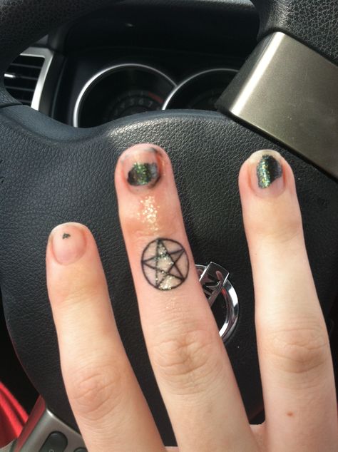 Freshly done pentagram finger tattoo Pentagram Finger Tattoo, Dream Piercings, Pentagram Tattoo, Tattoo Behind Ear, Finger Tattoo, Wanda Maximoff, Piercing Tattoo, Tattoo Inspo, Finger Tattoos