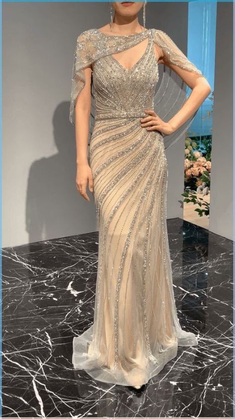 #PronDress#Outfit#Fashionista#FashionForward#TrendingNow Silver Evening Gowns, Mothers Gowns, Beaded Evening Gowns, Mother Of The Bride Dresses Long, Silver Gown, Sequin Evening Gowns, Drape Gowns, Mother Of The Bride Gown, Sisters Dress