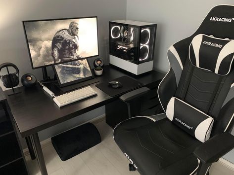 Is this setup too clean or just perfect? 👇 [via reddit user/BoiCleancut] This gaming setup is unique and clean! Almost too clean to me 😂 The black and white color theme is stunning and the pictures speak for themselves, no filter added by the owner! The desk is a solid wood countertop which he stained black and varnished. It is being held by legs and Alex drawers from IKEA. Perfect size desk for this space. For the PC build, he is using the NZXT H510 Elite case with NZXT Aer RGB fans. Check o Pc Gaming Setup Black And White, Black Gamer Room Aesthetic, Black And White Set Up Gaming, Black And White Gaming Room, Black Gamer Room, Black And White Pc Setup, Black Pc Setup, Black And White Gaming Setup, Black And White Setup