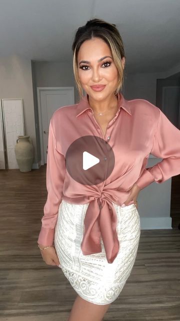 Lina Noory on Instagram: "Fashion Hack: How To Front-Tie Your Button Up Shirts 💫

Recreating one of my favorite #fashionhacks from last year!  I’ve received tons of requests to post a slower clip of how I tie my button up tops.  Now of course there’s so many different ways to do it, but this is definitely my go-to because it’s clean and chic.  It also stays in place, especially with satin shirts 💫

TAG someone who would love this, & don’t forget to save this video to refer back to when you’re getting ready! • #fashion #style #outfitideas #ootd #outfit #styletips #todayslook #beautytips #outfitinspo 

Here’s what you do:
1. Tie 2-3 buttons depending on how high you want the top.  In this video, I only used two because I’m wearing a high-waisted skirt and I wanted a cropped effect.
2. Pull Lina Noory, Satin Shirts, Front Tie Shirt, Stylish Shirt, Shirt Styles, Front Tie Top, Tag Someone Who, Ootd Outfit, Tag Someone