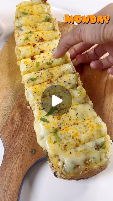 MERI RASOI 2024 | FOOD RECIPES on Instagram: "Extra Cheesy Garlic Bread Recipe for True Cheese Lovers 😍

Ingredients: ❤️

* Footlong Bread
* Butter - 50 grms
* Grated garlic - 2 tsp
* Oregano - 1 tsp
* Chilli flakes - 1 tsp
* Chopped coriander leaves
* mozzarella cheese
* Chilly Oil
* Seasoning
.
.
.
#cheese #lover #garlic #bread #recipe #snack #tasty #yummy #foodie #food #instafood #instagood #trending #viralreels" Chilly Oil, Cheesy Garlic Bread Recipe, Garlic Bread Recipe, Cheesy Garlic Bread, Bread Butter, Cheese Lover, Chilli Flakes, Coriander Leaves, Foodie Food