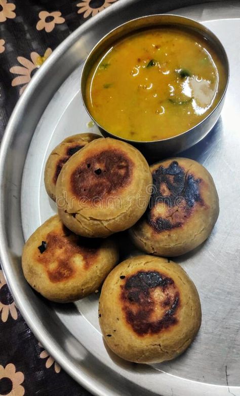 Dal baati dish Photo about cuisine, dish, churma, dairy, fruit, baati, dessert, snack, breakfast, produce, plant, bread, baking, indian, food, vegetable, meal, meat - 178806948 Dal Baati Churma, Vegetable Meal, Indian Food, Bread Baking, Indian Food Recipes, Indiana, Dairy, Bread, Dessert