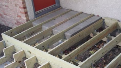 What are your options for building a deck over concrete stairs?  You can demolish the stairs or build the frame around it. Deck Over Concrete Steps, Deck Over Concrete, Deck Building Plans, Outdoor Living Deck, Concrete Deck, Laying Decking, Deck Framing, Framing Construction, Deck Steps