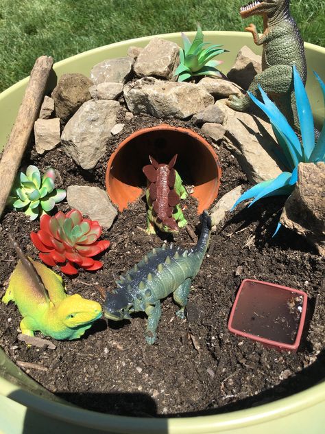 Dino Garden, Outdoor Dinosaur Garden, Dinosaur Fairy Garden, Dinosaur Garden Ideas, Dinosaur Play Table, Kids Garden Play Area, Dinosaur Small World, Dinosaur Garden, Backyard Kids Play Area