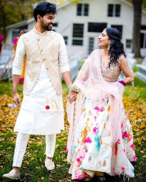 Bhargavi Amirineni® on Instagram: "Our bride and groom rocking their haldi looks! . BA groom in colourful asymmetric jacket and kurtha set to match his bride's outfit for their haldi event. . . . #haldi #whitehaldi #groomoutfits #menswear #designerwear #shopnow #jacket #asymettric #groom #indiangroom #weddingoutfits #hyderabad #groomessentials #shopnow #coupleoutfits #bhargaviamirinenidesigns #worldofba" Groom Mandap Outfit, Pithi Outfit For Groom, Latest Haldi Outfit For Bride And Groom, Haldi Ceremony Outfit For Bride And Groom, Unique Haldi Outfits For Bride And Groom, Haldi Outfit Groom, Sagai Outfit Indian Weddings, Haldi Outfits For Bride And Groom, Haldi Outfits For Groom