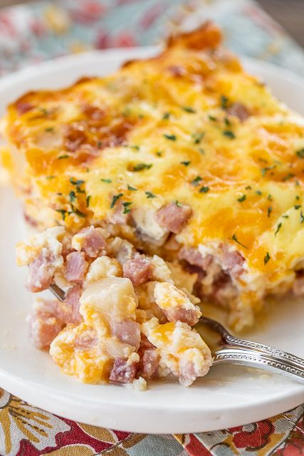 Ham & Potato Breakfast Casserole - our favorite breakfast casserole! Great make-ahead casserole for potlucks, overnight guests and the holidays! Only 5 ingredients! Ham, cream of potato soup, eggs, milk, and cheddar cheese. Can freeze for a quick meal later. Serve with some fruit and biscuits. Everyone RAVES about this delicious breakfast casserole. #recipe #breakfast #ham #casserole #breakfastcasserole #freezermeal Breakfast Casserole With Potatoes, Casserole With Potatoes, Potato Breakfast Casserole, Breakfast Ham, Ham Breakfast Casserole, Potatoes And Ham, Ham And Potato Casserole, Easy Breakfast Casserole Recipes, Breakfast Potato Casserole