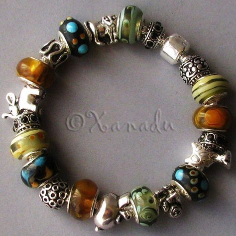 Going On Safari Charm Bracelet  Black Brown by xanaducharms, $39.95 Gemstone Bracelets Ideas, Pandora Bracelet Charms Ideas, Pandora Bracelet Designs, Bracelets Ideas, On Safari, Pandora Beads, Pandora Bracelet Charms, Jewelry Lookbook, Tiger's Eye