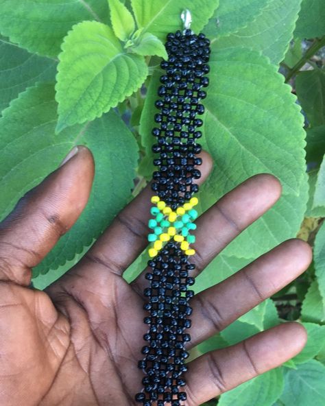 “Embrace your island vibes with our vibrant national flag. 🌴 Black, gold and green beads come together to represent the beauty and spirit of Jamaica 🇯🇲. Follow us on Instagram @cleantomistepentertainment_ja for more handcrafted jewelry that celebrate Jamaican culture! #ctmse #JamaicanPride #IslandVibes #HandCraftedJewelry #bracelets #braceletoftheday #artist #braceletlover #smallbusiness #braceletshop #braceletforsale #art #handmadeaccessory #handmadebracelet #handcraftedwithlove #empowe... Jamaican Culture, Gold And Green, Green Beads, Island Vibes, National Flag, Green Bead, Handmade Accessories, Jamaica, Handmade Bracelets