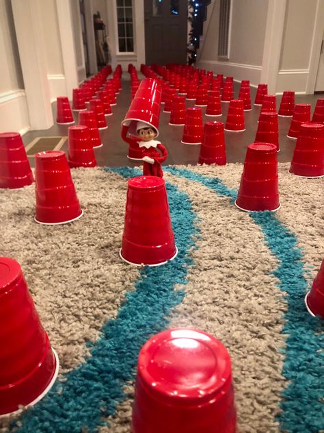 Elf On The Shelf Ideas With Gifts, Elf Day One, Elf On The Shelf Cup Game, Elf Solo Cup, Elf On The Shelf Red Solo Cups, Christmas Elves Hiding Places, Elk On The Shelf Ideas Elves, Elves Workshop Decorations, Happy Christmas Card