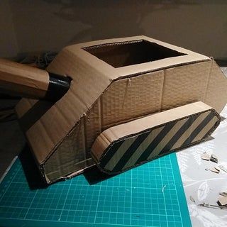 Cardboard Army Tank Diy, Diy Tank Costume, Cardboard Tank Diy, Tank Costume Diy, Diy Cardboard Box Car, Diy Army Tank, Army Tank Costume, Army Tank Halloween Costume, Cardboard Race Cars