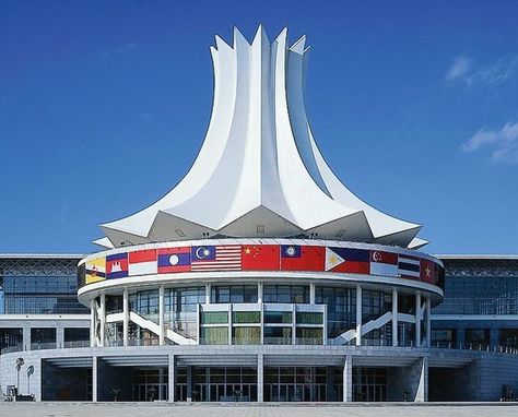 Nanning International #Convention & #Exhibition Center covers an area of 600 mu of land, and its main building covers 152,100 m2 in total. The building of the center is carefully designed and situated on mountains, with a magnificent looking. Its dome consists of twelve parts, like the petals of a hibiscus rosa-sinensis - the city flower of Nanning, which represent the twelve nationalities that have been lived in Guangxi from long ago. Nanning, The Building, Supply Chain, D 2, Architecture Building, Marina Bay Sands, Nice View, Sailing Ships, Statue Of Liberty