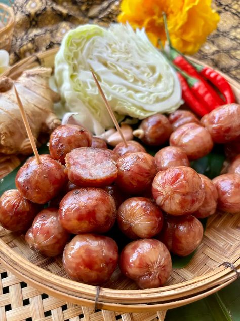 Make the best sai krok Isan with this authentic Thai sausage recipe. Perfect as a snack on the go or as a side for your next meal. Thai Sausage Recipe, Lao Sausage Recipe, Thai Dumplings, Thai Sausage, Homemade Dipping Sauce, Lao Food, Sausage Making, Laos Food, Pork Salad