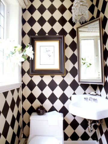 Harlequin wallpaper has a stunning effect in this small-space bathroom. Keeping the colors to simple black and white gives it dignity, not disorganization. Dramatic Powder Room, Harlequin Wallpaper, White Bathroom Tiles, Small Space Bathroom, Casa Vintage, Art Deco Wallpaper, Black And White Wallpaper, Bathroom Wallpaper, Room Wallpaper