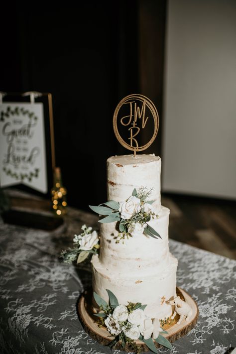 Our wedding cake was created by Icing for Izaac located in Ft. Wayne, IN. The photo was captured by @Anapiersonphotgraphy 
Topper and Florals purchased on Etsy! Wedding Cake Green And White, Wedding Cake Green White, Wedding Cakes Dog, Wedding Cake Green, Wedding Cake Designs Simple, Green Wedding Cake, Rustic Wedding Photos, Green Themed Wedding, Floral Wedding Cake